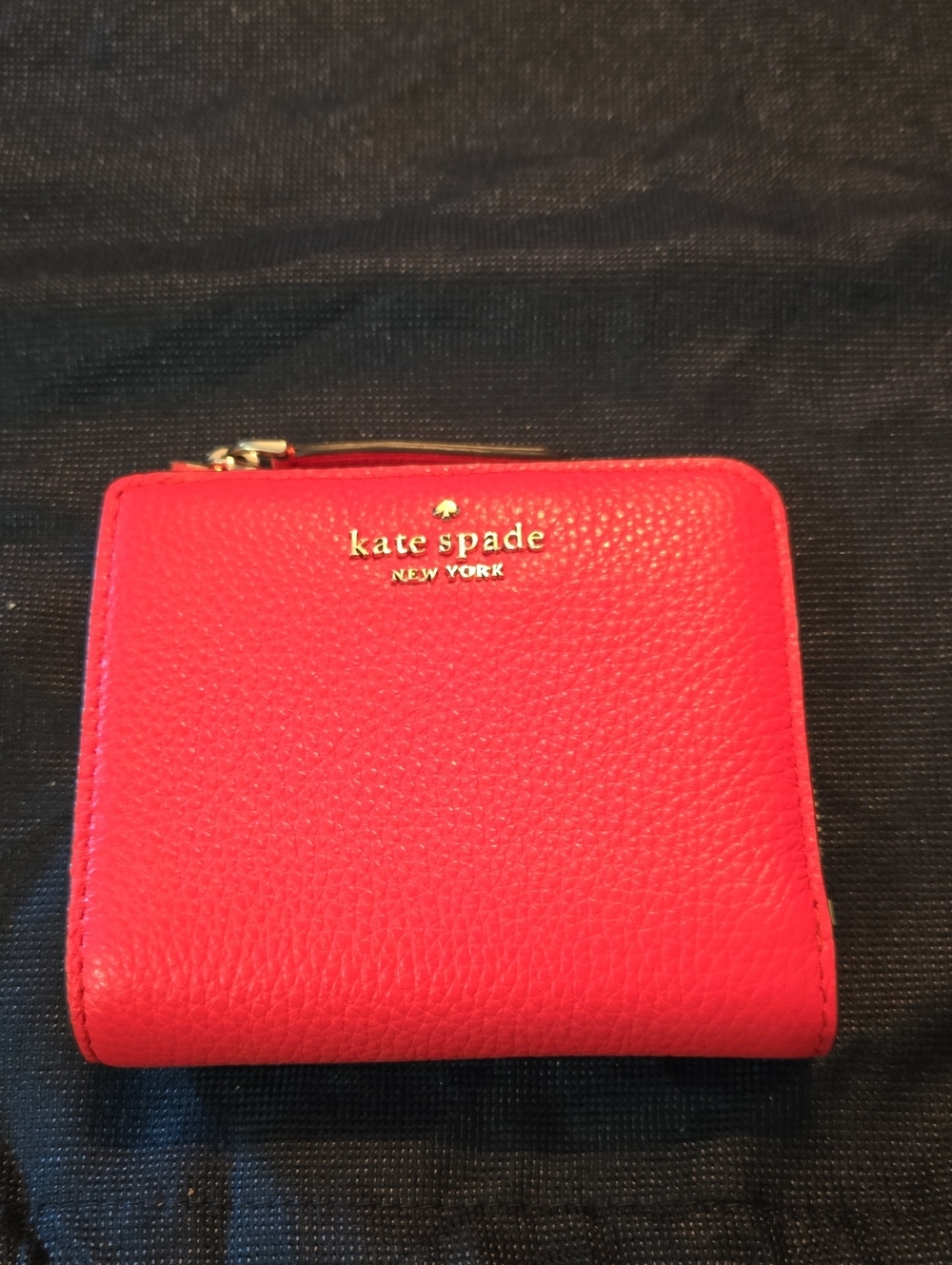 kate spade coral pebble leather zip-around wallet